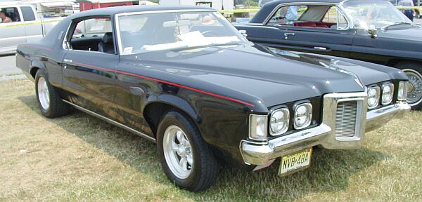 the Pontiac Grand Prix with its General Motors drivetrain and its long hood