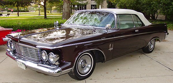 A 1963 Chrysler Imperial Convertible and a Plymouth Valiant